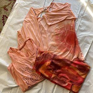 2 3/4 length sleeve shirts and one pair of leggings.